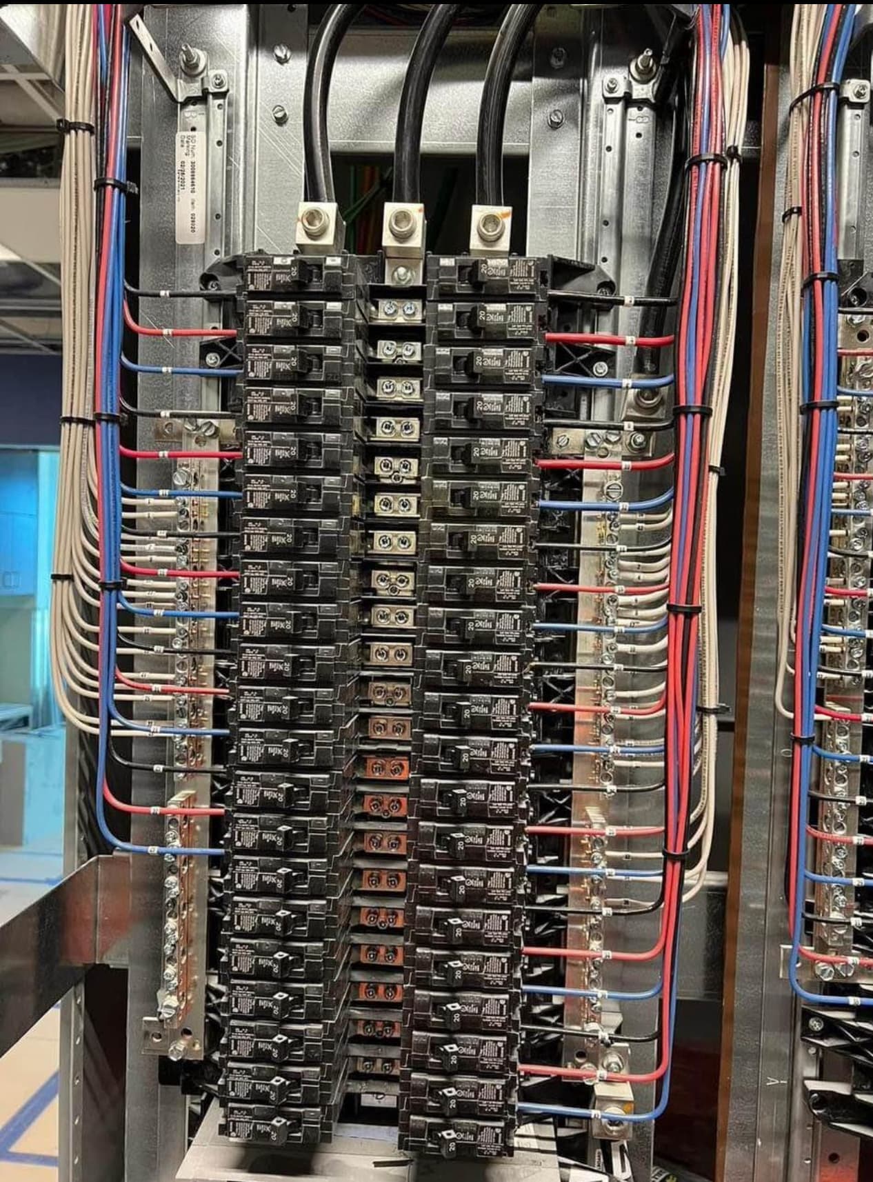 Multi-circuit commercial distribution panel wired and dressed by Yalla Electric