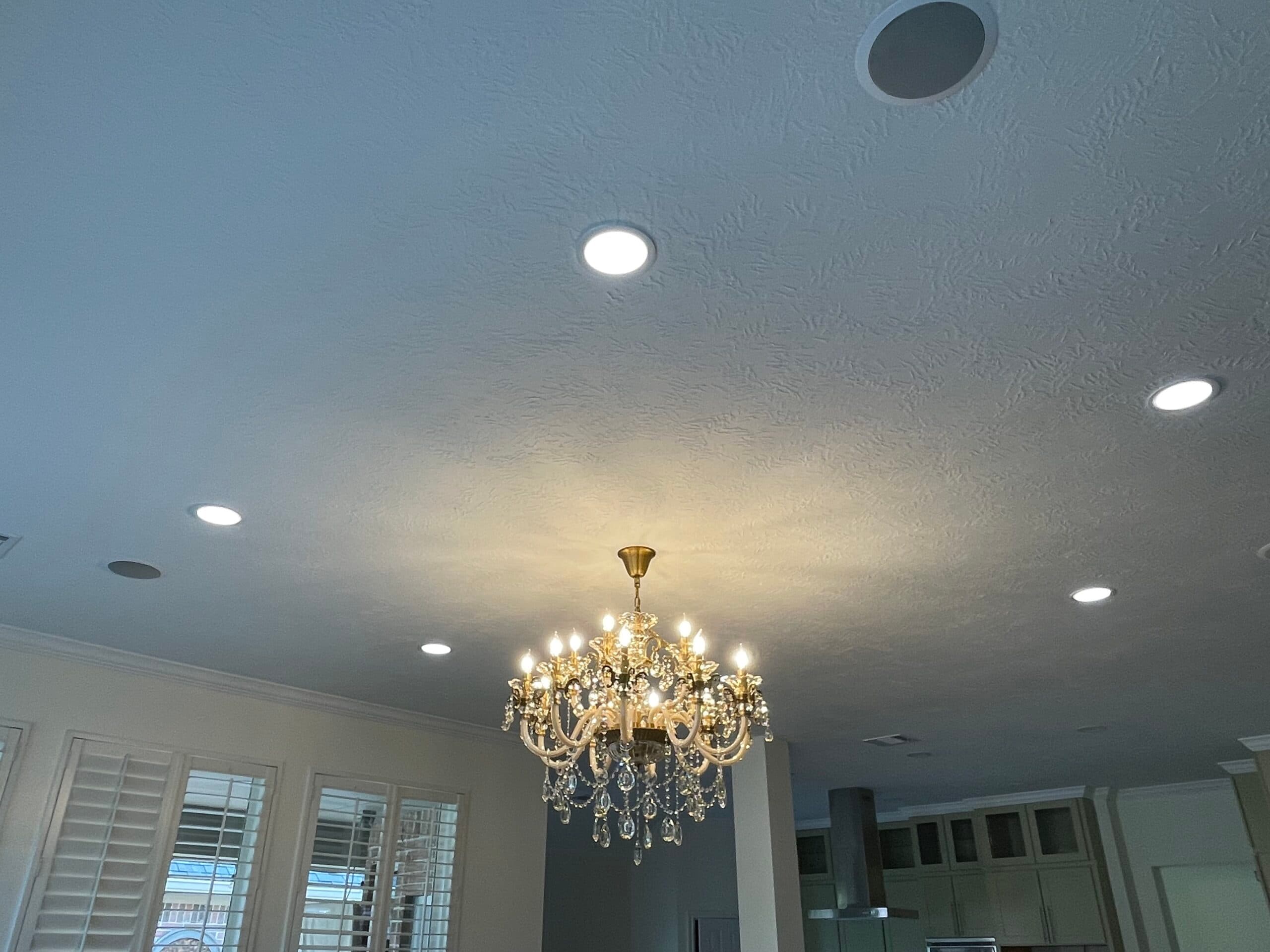 Whole-Home Lighting Trim-Out - Recessed layout, feature chandelier, and speaker pre-wire at trim